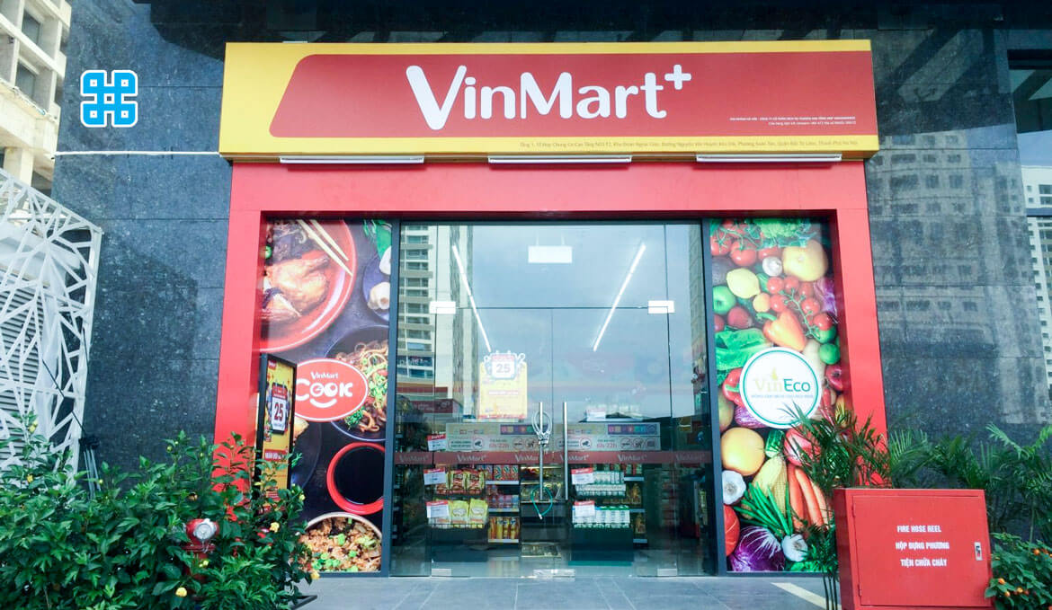 bảng hiệu alu trước cửa hàng vinmart