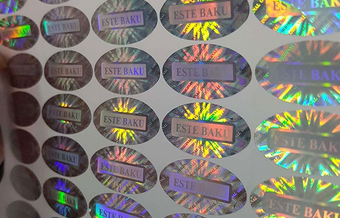 In tem bảo hành 7 màu chất liệu hologram