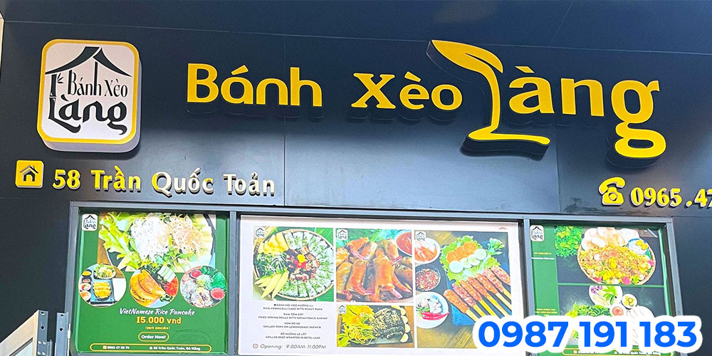 Bảng hiệu tiệm bánh xèo làm với tông màu đen đặc trưng